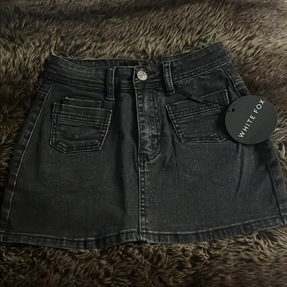Black denim mini skirt